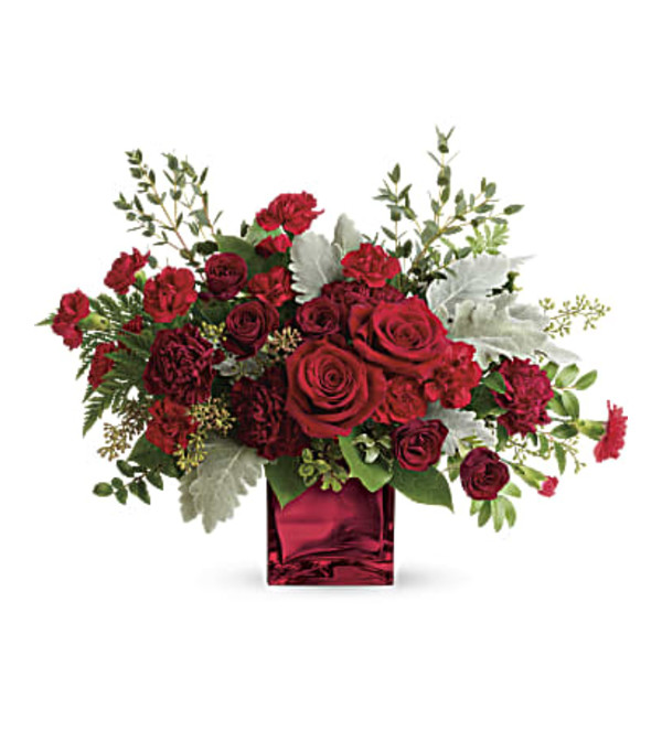 all red valentines day flowers in red vase with mixed greenery 
